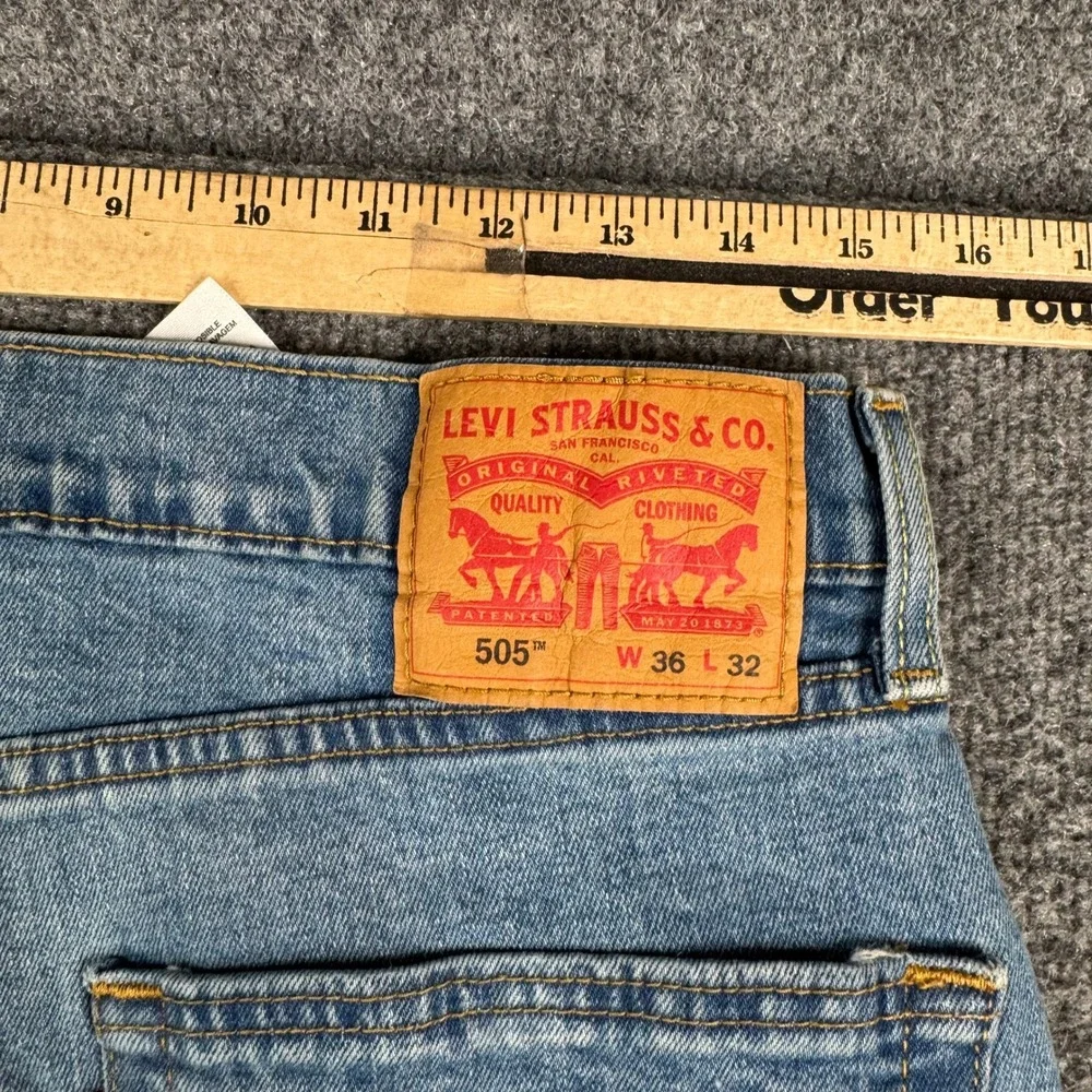 Levi's Jeans Mens Size 36x32 505 Regular Fit Straight Leg Light Wash Stained